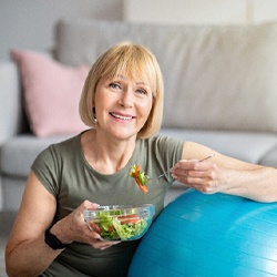 older woman eating healthy food