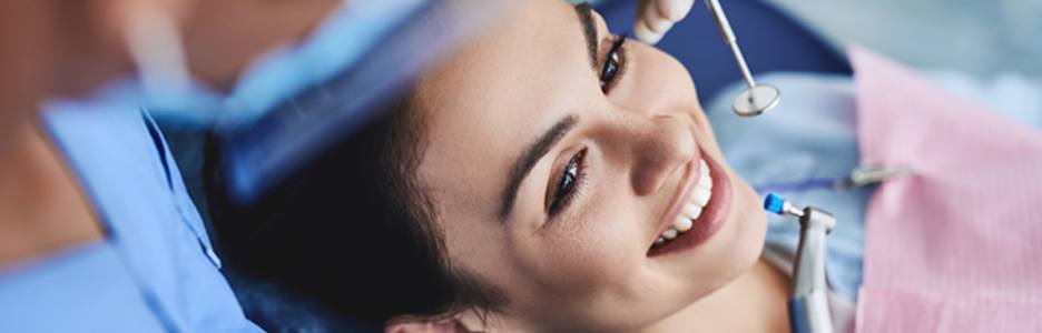 person getting their teeth cleaned