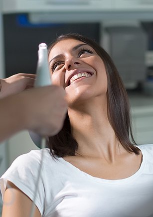 Smiling woman in dental chair