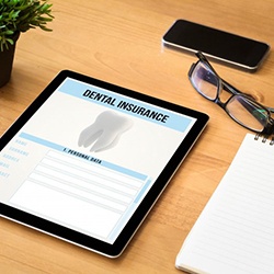 a tablet with a dental insurance form