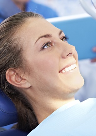 Smiling woman in dental chair