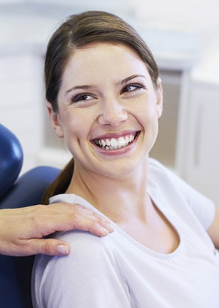 Smiling woman in dental chair