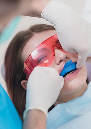 Child receiving dental treatment