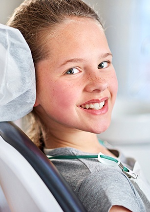 Smiling child in dental chair