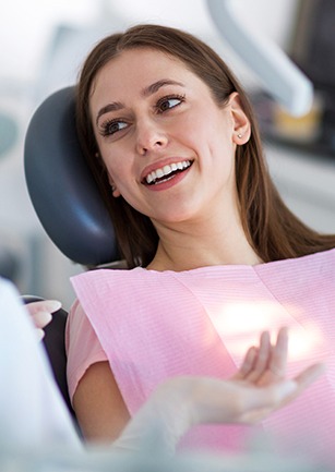 Smiling woman in dental chair