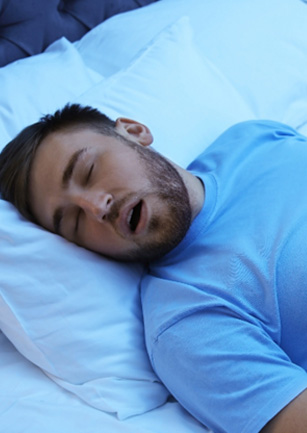 Man sleeping with his mouth open