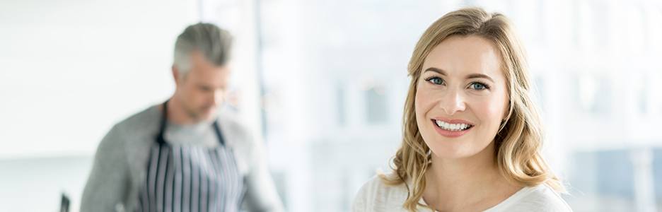 Woman smiling in kitchen