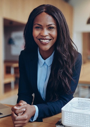 Businesswoman smiling with veneers in Cambria