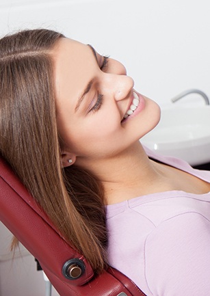 Relaxed woman in dental chair