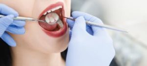 A woman getting a dental exam