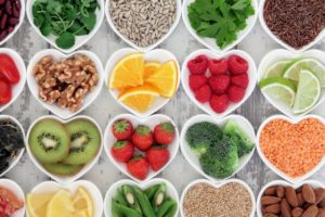 Heart-shaped bowls of snacks recommended by your dentist for gum health