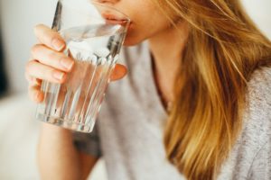 Woman with fluoride in drinking water.